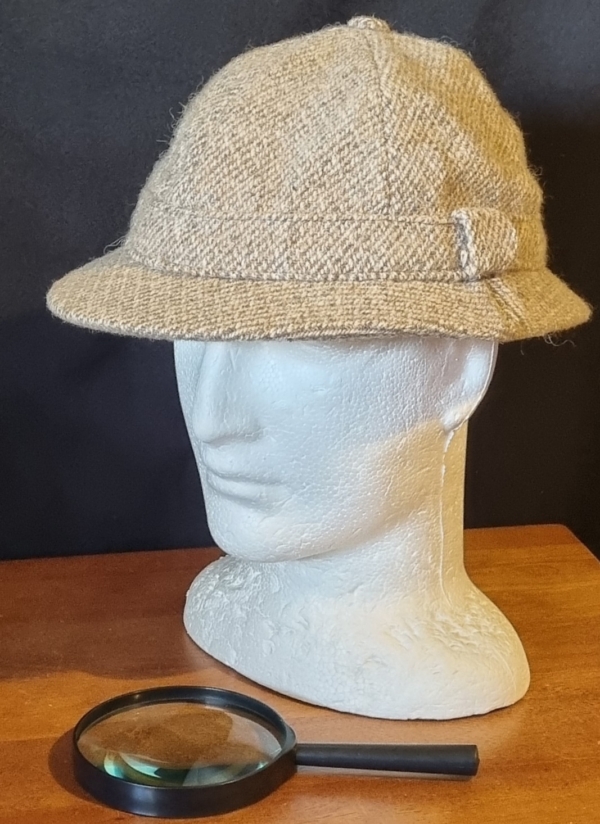 'Sherlock Holmes' Tweed hat, by 'Harris Tweed England', & magnifying glasses