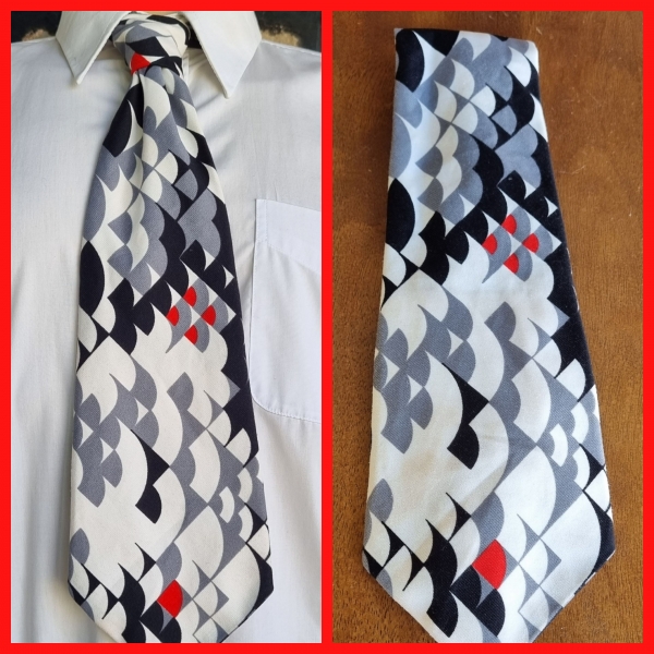 1970's wide tie, polyester, by 'Los Hombres', grey/cream/black/red