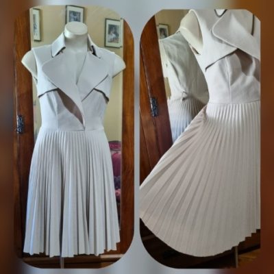 Sleeveless, sunray pleat skirt dress, by 'Karen Millen', size 10